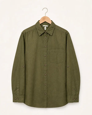 An olive green long-sleeve button-up shirt with a chest pocket and button details on the cuffs, hanging on a wooden hanger against a plain off-white background.